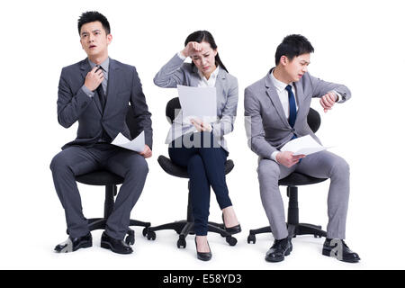 Ansiosa attesa dei candidati per il colloquio Foto Stock