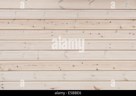 Sfondo di legno - impilate orizzontalmente tavole di pino Foto Stock