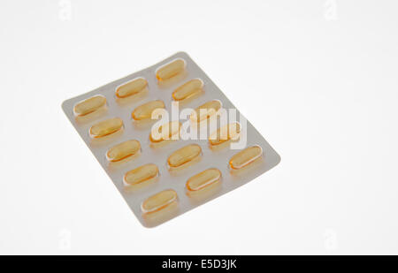 Salute, Farmaci, giallo capsule in confezione blister. Foto Stock