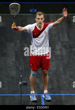 Glasgow, Scozia. 28 Luglio, 2014. Nick Matteo di Inghilterra celebra dopo la Uomini Singoli medaglia d oro finale di Squash contro James Willstrop d'Inghilterra il giorno 5 del Glasgow 2014 Giochi del Commonwealth a Scotstoun Campus sportivo a Glasgow, Scozia, il 28 luglio 2014. Nick Matthew ha vinto 3-2. Credito: Wang Lili/Xinhua/Alamy Live News Foto Stock