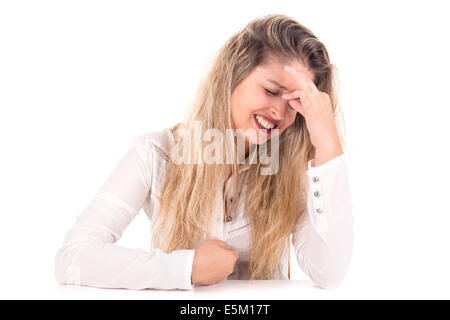 Bella giovane donna con mal di testa isolato in bianco Foto Stock