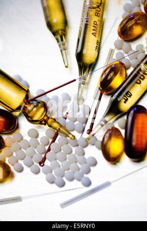 L'agopuntura, omeopatia, e traccia minerale integratore alimentare. Foto Stock
