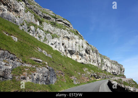 Marine Drive strada a pedaggio acceso attorno al promontorio del Great Orme, Llandudno, Galles Foto Stock