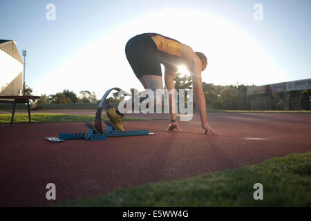 Sprinter in posizione di avviamento Foto Stock