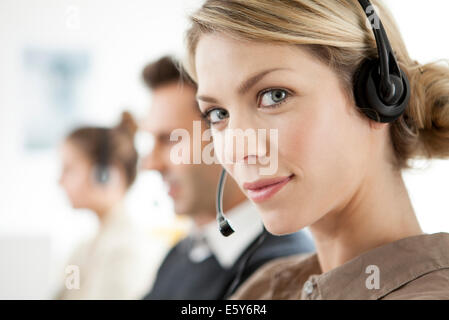 La società di telemarketing lavorano nei call center Foto Stock