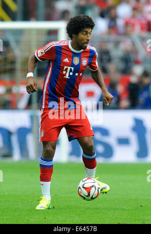 Dortmund, Germania. 13 Ago, 2014. Calcio, Germania, Supercup, Signal Iduna Park Dortmund: Bor. Dortmund, BVB - FC Bayern Monaco, FCB 2:0; Dante (FCB). Credito: UKraft/Alamy Live News Foto Stock