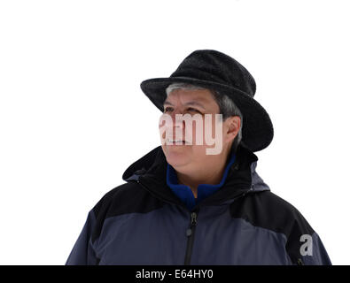 Donna di mezza età in abbigliamento invernale, guardando a sinistra Foto Stock