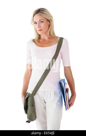 Bionda studente matura la sacca di custodia e libri Foto Stock