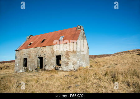 Sulla strada per il Dundonnell, passerete questo hoose abbandonati. Foto Stock