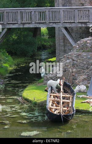 Curragh e contadino medievale Foto Stock