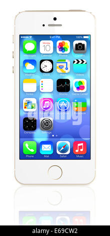 Oro iPhone 5s che mostra la schermata iniziale con iOS7. Foto Stock