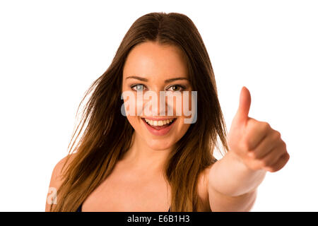 Bella asiatica donna caucasica gesticolando successo che mostra il pollice fino isolato Foto Stock