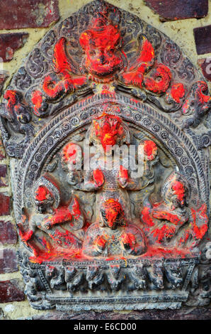 Intagliare sulla parete in Patan Durbar Square è situato al centro di Lalitpur Sub-Metropolitan città in Nepal Foto Stock