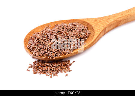 Semi di lino, i semi di lino su un cucchiaio di legno Foto Stock