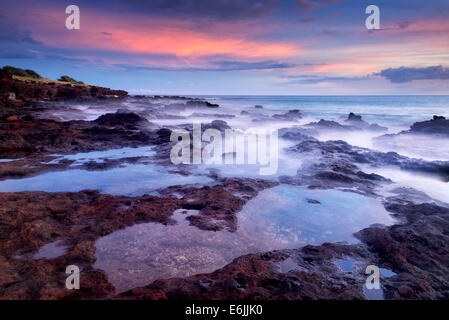 Tramonto e tidepools. Lanai, Hawaii Foto Stock