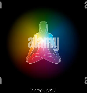 Colorate aura mistica di una donna meditando in posizione di yoga. Foto Stock