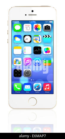 Oro iPhone 5s che mostra la schermata iniziale con iOS7. Foto Stock