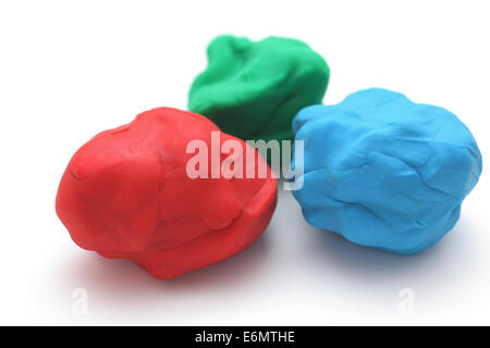 Coloratissimo gioco del bambino di argilla (rosso, verde, blu). Foto Stock