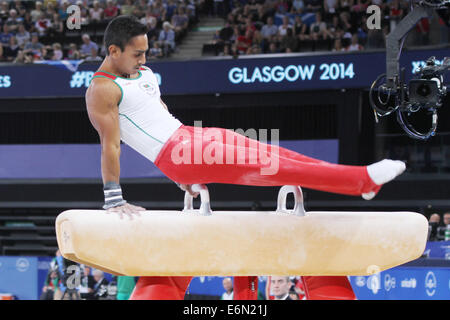 Quazi Syque CAESAR del Bangladesh sul cavallo nella ginnastica artistica al 2014 giochi del Commonwealth a Glasgow. Foto Stock