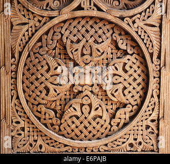 Ornamento sulla porta di legno Foto Stock