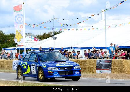 Legacy Suburu 555 rally car in corrispondenza di Chris Evans' CarFest Sud in aiuto dei bambini in stato di necessità Foto Stock