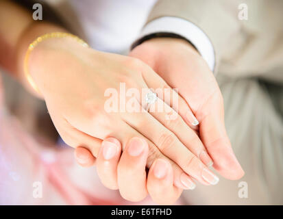 Tenendo la mano Foto Stock