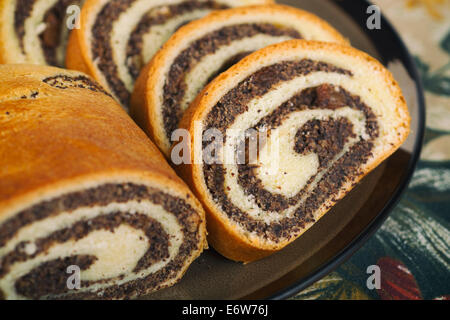 Rotolo di semi di papavero Foto Stock