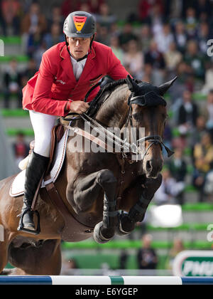 Caen, Francia. 02Sep, 2014. Rider Christian Ahlmann della Germania a cavallo 'Codex' compete in Show Jumping concorrenza durante il World Equestrian Games 2014 a Caen, Francia, 02 settembre 2014. Foto: ROLF VENNENBERND/DPA/Alamy Live News Foto Stock