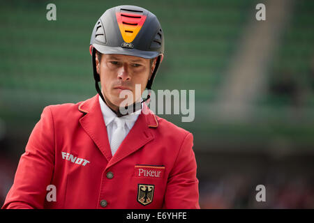 Caen, Francia. 02Sep, 2014. Rider Christian Ahlmann della Germania a cavallo 'Codex' compete in Show Jumping concorrenza durante il World Equestrian Games 2014 a Caen, Francia, 02 settembre 2014. Foto: ROLF VENNENBERND/DPA/Alamy Live News Foto Stock