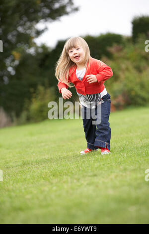 3 anno vecchia ragazza con la sindrome di Down Foto Stock