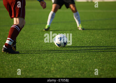 I giocatori di calcio durante le fasi di gioco Foto Stock