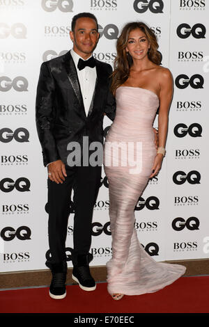 Lewis Hamilton e Nicole Scherzinger arrivare per la GQ Men of the Year Awards 2014. Foto Stock