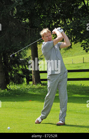 Andando, Austria. 03Sep, 2014. Ex finlandese di formular one driver Mika Haekkinen gioca un round di golf durante il 'Kaiser' Trofeo di golf tournament come parte del "Camp Beckenbauer' evento in Reith, Austria, 3 Septmeber 2014. © dpa picture alliance/Alamy Live News Foto Stock