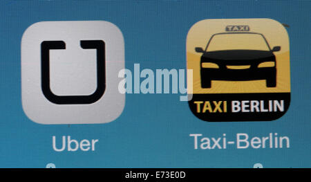 Berlino, Germania. 11 Giugno, 2014. (FILE) - Illustrazione - Un archivio foto mostra le icone delle app di autostop servizio 'uber' (L) e servizio taxi " Taxi Berlin" di Berlino, Germania, 11 giugno 2014. Controverso autostop service Uber ha ampliato i propri servizi a 24 nuove destinazioni in tutto il mondo. Foto: Joerg Carstensen/dpa/Alamy Live News Foto Stock