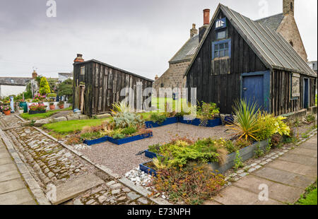 FOOTDEE o il villaggio di pescatori di Aberdeen PORTO VECCHIO rimani alette realizzate da DRIFTWOOD Foto Stock