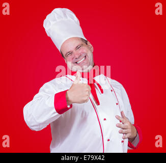 Lo chef mostra Thumbs up gesto Foto Stock