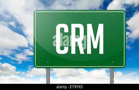 CRM su autostrada verde Signpost. Foto Stock