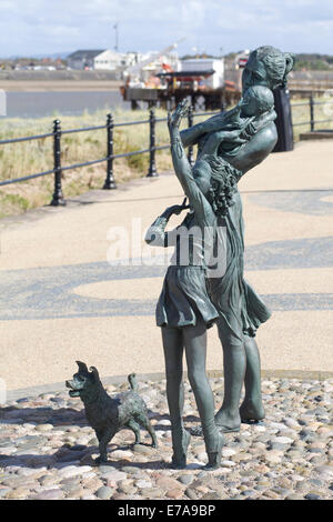 Benvenuti a casa statua a Fleetwood con la Knott fine di uno scalo in background Foto Stock