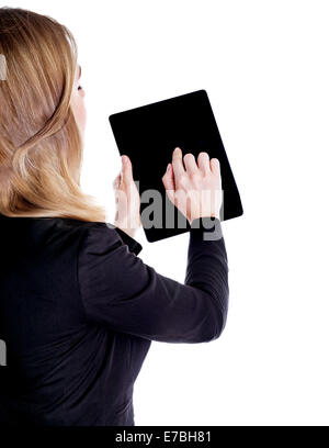 Lato posteriore della donna d'affari di successo utilizzando tablet isolati su sfondo bianco, lavorando sul touchpad, Wireless internet Foto Stock