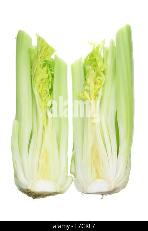 Il sedano tagliato in due metà Foto Stock