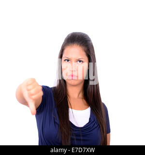 Giovane donna thumbing giù isolati su sfondo bianco Foto Stock