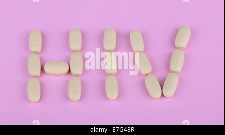 La terapia dell'hiv efavirenz su sfondo rosa Foto Stock
