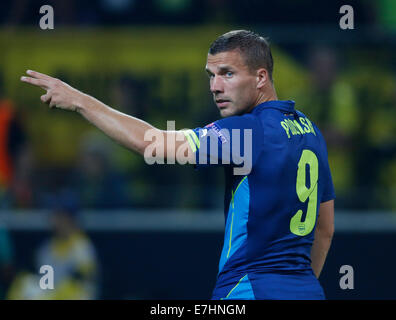 Dortmund , Deutschland, la Germania, la UEFA Champions League , Giornata 1 , Borussia Dortmund - Arsenal FC 2-0 in Signal Iduna Park Stadium di Dortmund il 16.09. 2014 Lukas Podolski (ARS) Foto : Norbert Schmidt © norbert schmidt/Alamy Live News Foto Stock