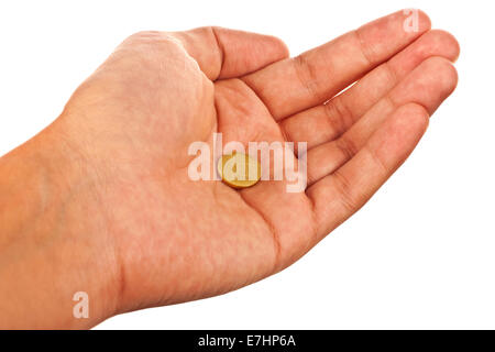 Mano con una moneta romania isolate su sfondo bianco Foto Stock