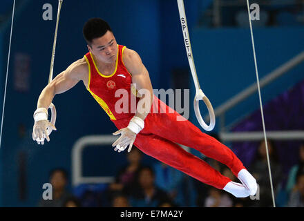 Incheon, Corea del Sud. Xxi Sep, 2014. Liao Junlin della Cina compete durante gli anelli di uomini ginnastica evento artistico al XVII Giochi Asiatici in Incheon, Corea del Sud, Sett. 21, 2014. Credito: Zhu Zheng/Xinhua/Alamy Live News Foto Stock