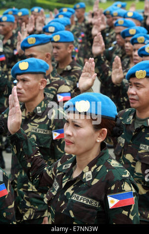 Pasay City, Filippine. Il 22 settembre, 2014. I soldati delle forze armate delle Filippine (AFP) frequentano il send-off cerimonia per il XVIII contingente AFP alla forza di pace della Nazioni Unite all'Villamor Air Base in Pasay City, Filippine, Sett. 22, 2014. 157 soldati saranno assegnati a Haiti per meno di un anno. Credito: Rouelle Umali/Xinhua/Alamy Live News Foto Stock