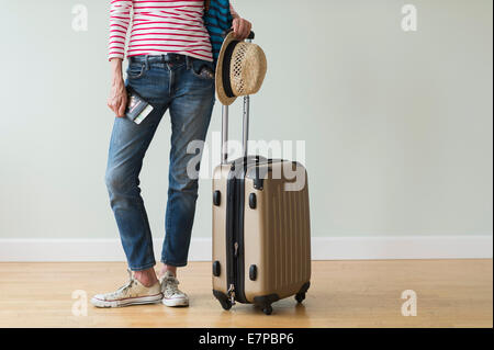 Donna pronto per andare in vacanza Foto Stock