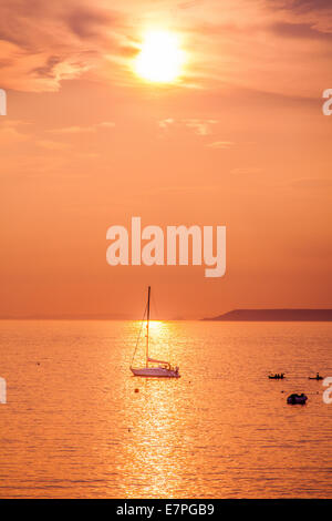 Tramonto sul mare a Hope Cove, South Devon, Devon, Inghilterra, Regno Unito. Foto Stock