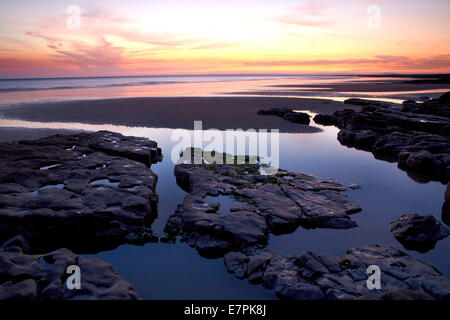 Tramonto a riposo Bay, Porthcawl, Bridgend, Galles del Sud Foto Stock