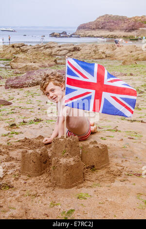 Castello di sabbia sulla speranza Cove Beach, Devon, Inghilterra, Regno Unito. Foto Stock